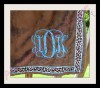 ADK stitched on a minky wrap.